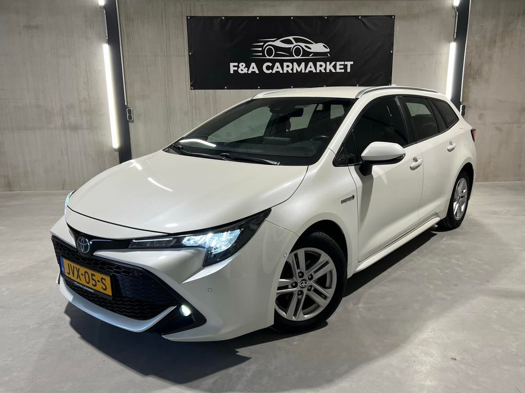 Toyota Corolla 1.8 Hybrid Dynamic | CarPlay | 6 mnd Garantie, 450 kg, Corolla, Wit, 98 pk