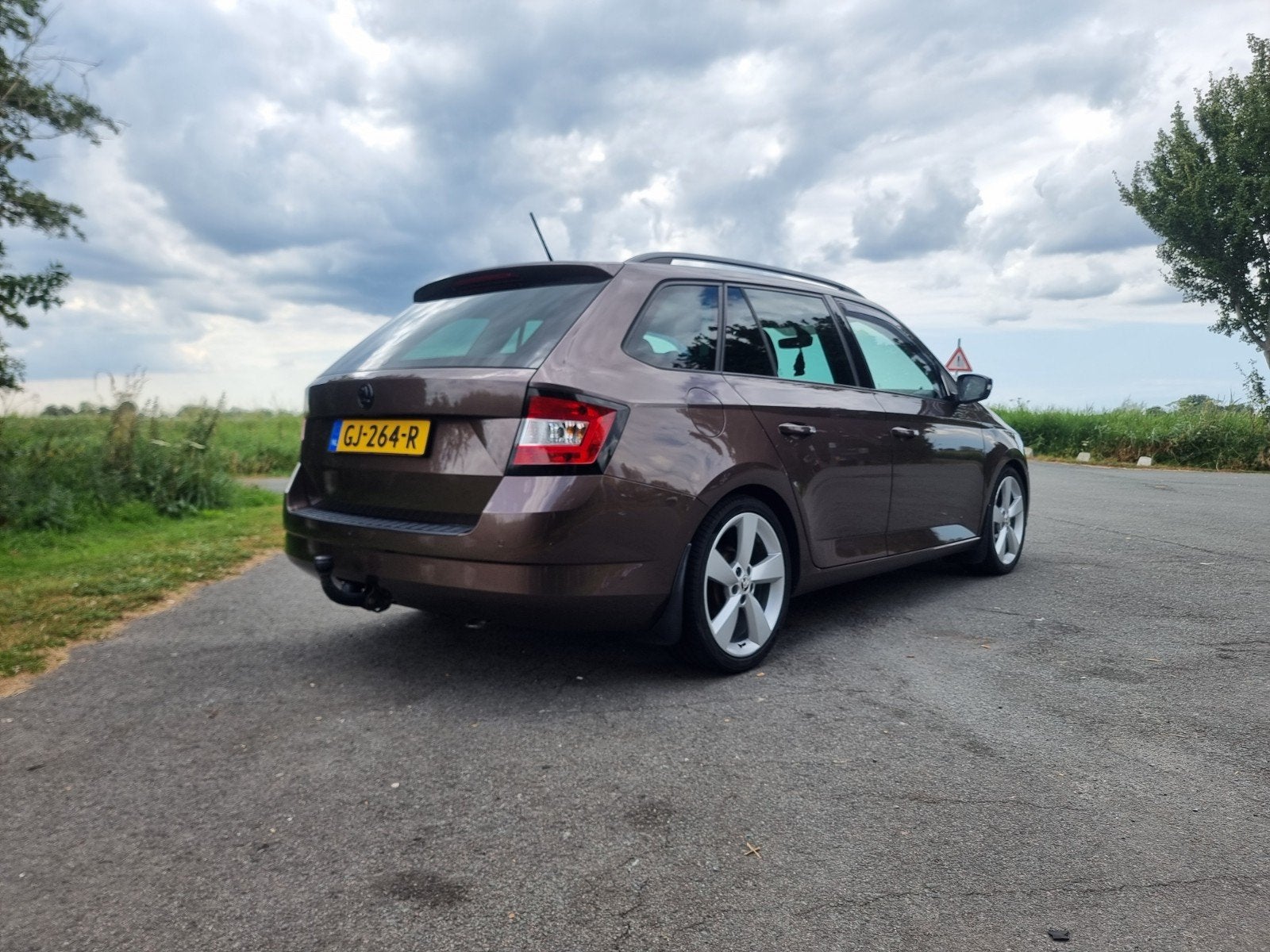 Skoda Fabia 1.2 TSI 90pk Greentech 2015 Bruin, Auto's, Stof, 40 €/maand, Zwart, 4 cilinders