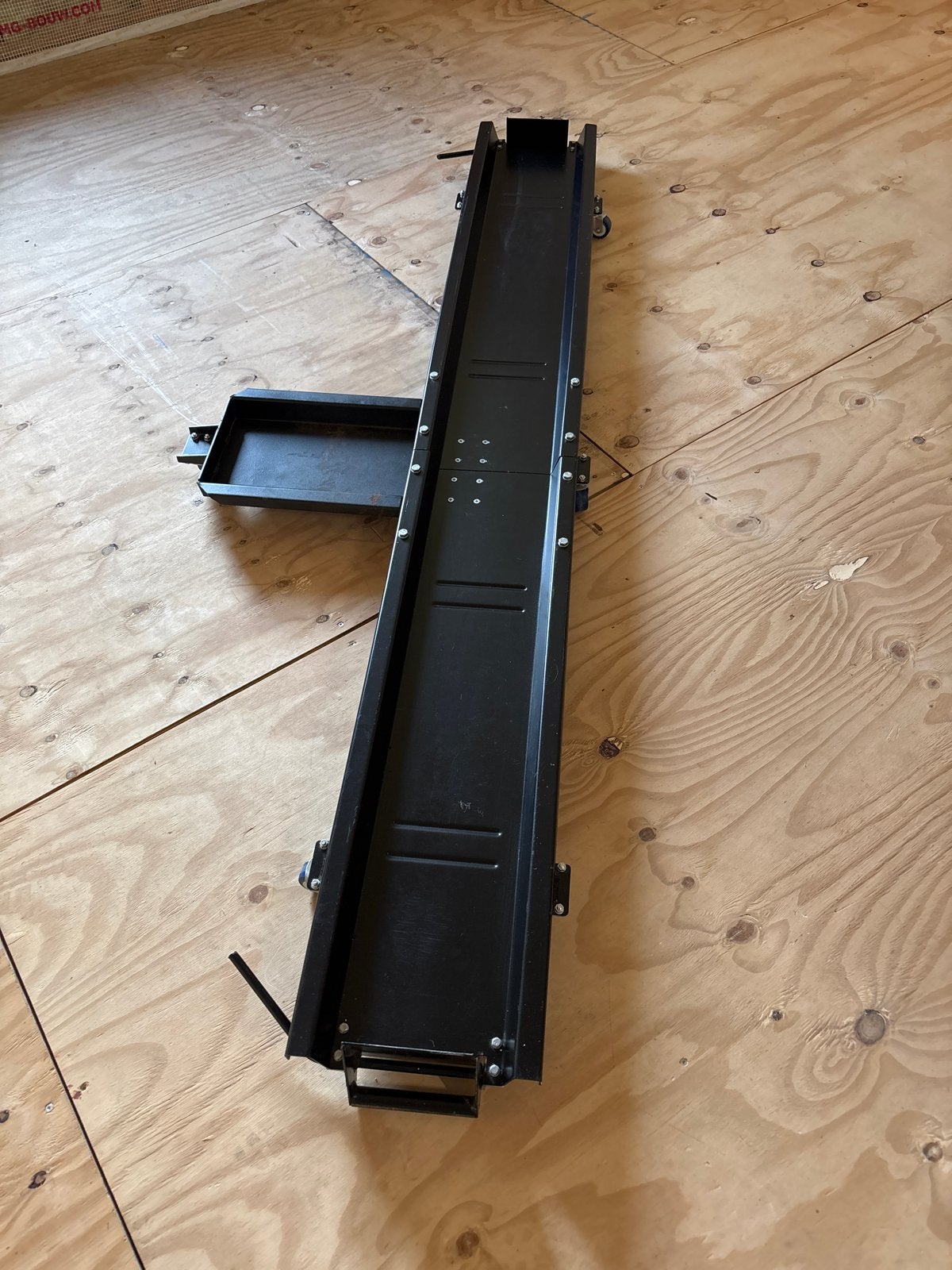 Motor mover met wieltjes en oprijplaatjes, Ophalen