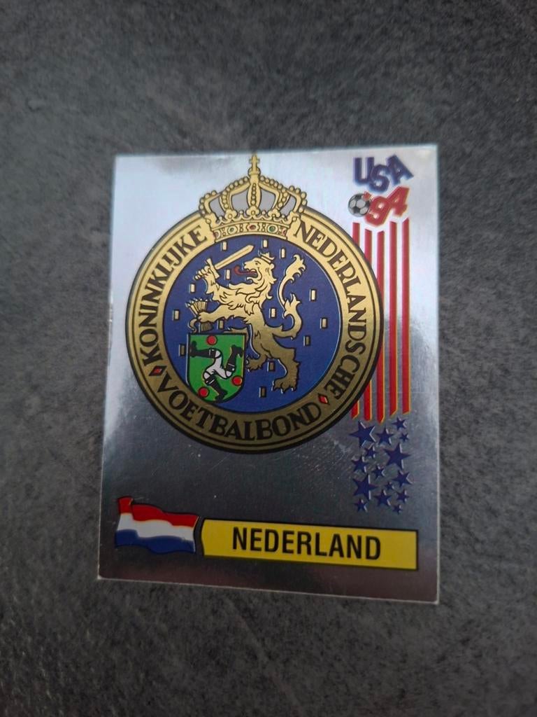 Panini sticker WK 94 USA. Embleem Nederland., Verzenden, Zo goed als nieuw, Sticker