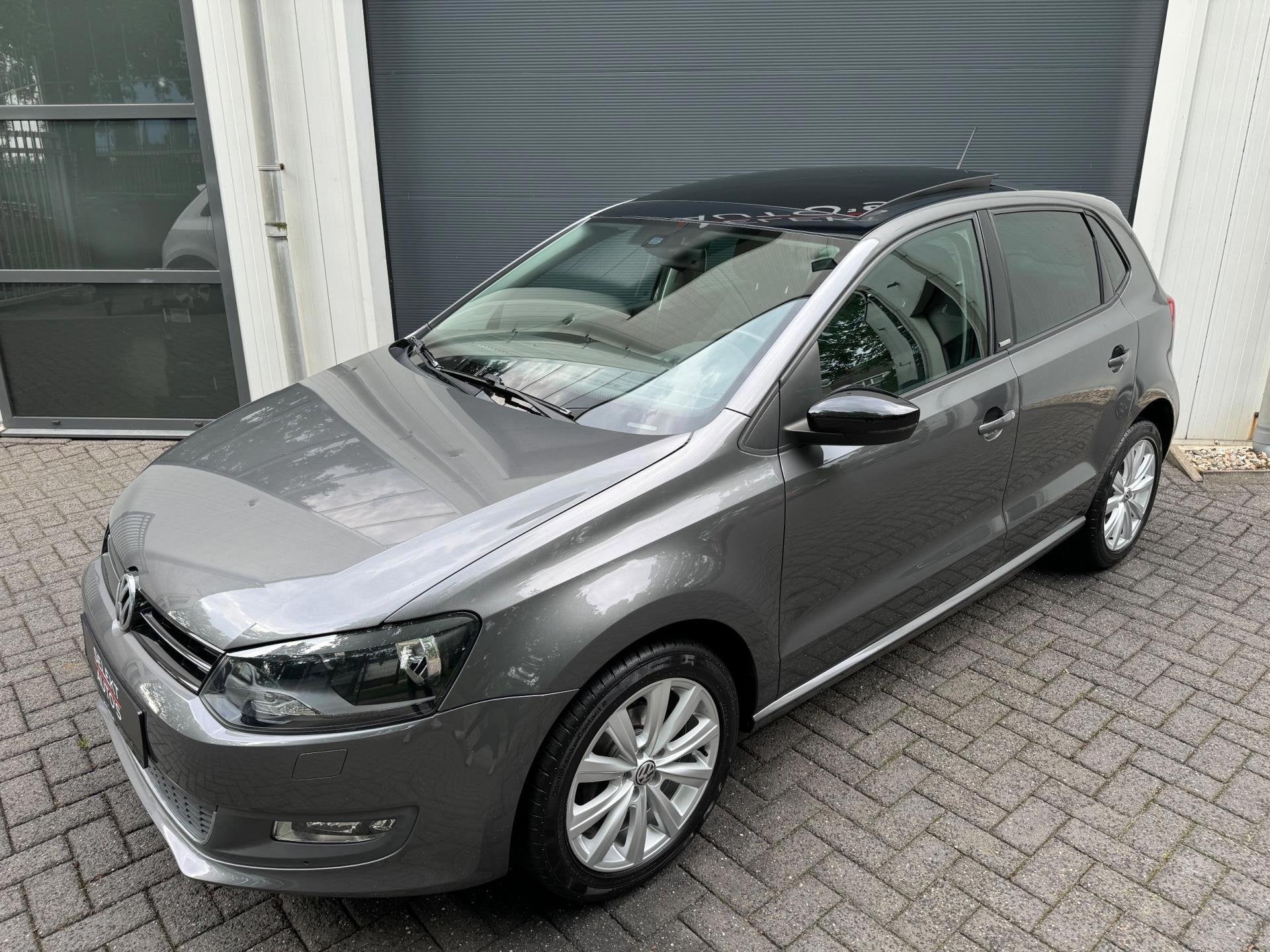 Volkswagen Polo 1.4-16V Style Panoramadak/Airco/Cruise/Navig, Voorwielaandrijving, Dealer onderhouden, 86 pk, Gebruikt
