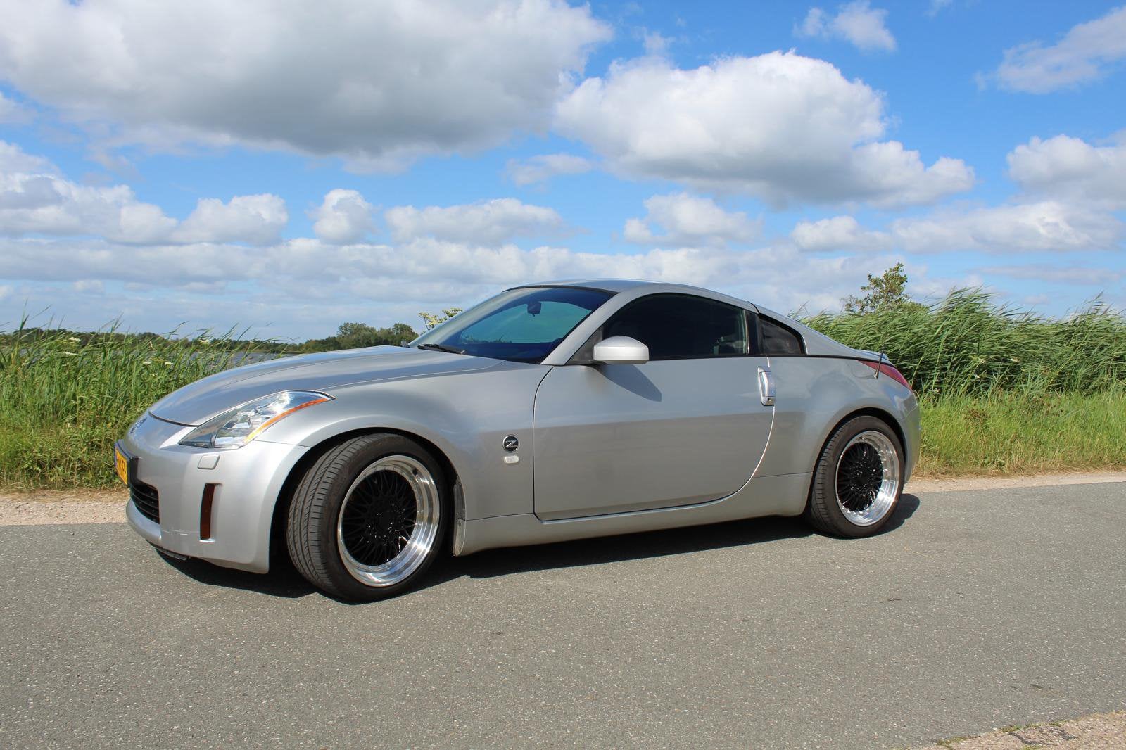 Nissan 350Z 3.5 V6 24V 2004 Grijs, Auto's, Nissan, 350Z, Achterwielaandrijving, Zwart, Handgeschakeld