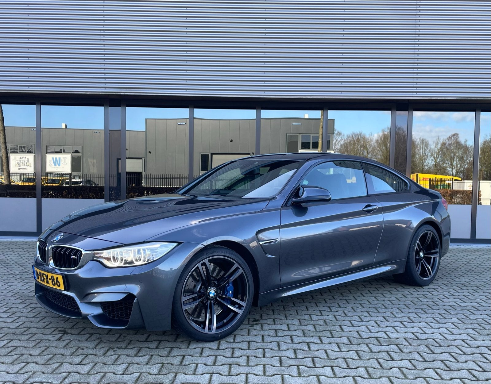 BMW M4 3.0 Coupe 2014 Grijs handgeschakeld, Auto's, 431 pk, Zwart, 4-Serie, 4 stoelen