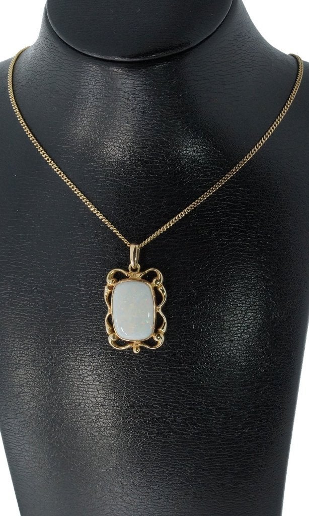 Opaal edelsteen fraaie 14k gouden ketting hanger vintage, Voordeelsieraden, Ophalen of Verzenden, Zo goed als nieuw, Met edelsteen
