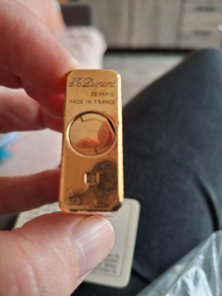 Vergulde dupont aansteker, Ophalen, Aansteker