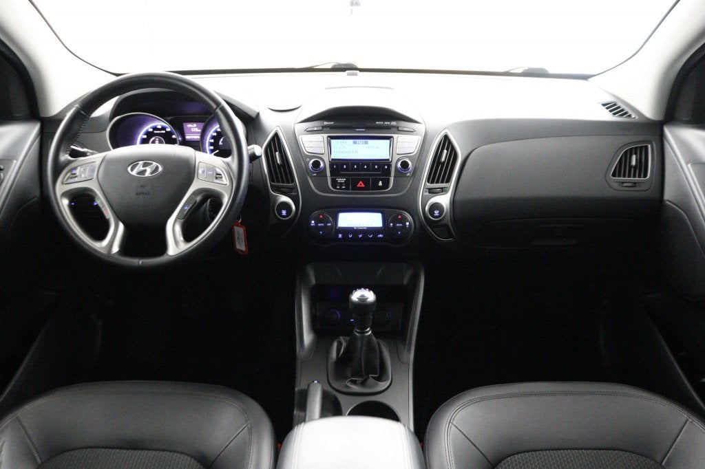 Hyundai ix35 2.0i Style (bj 2010), Auto's, Gebruikt, Zwart, 4 cilinders, Leder en Stof