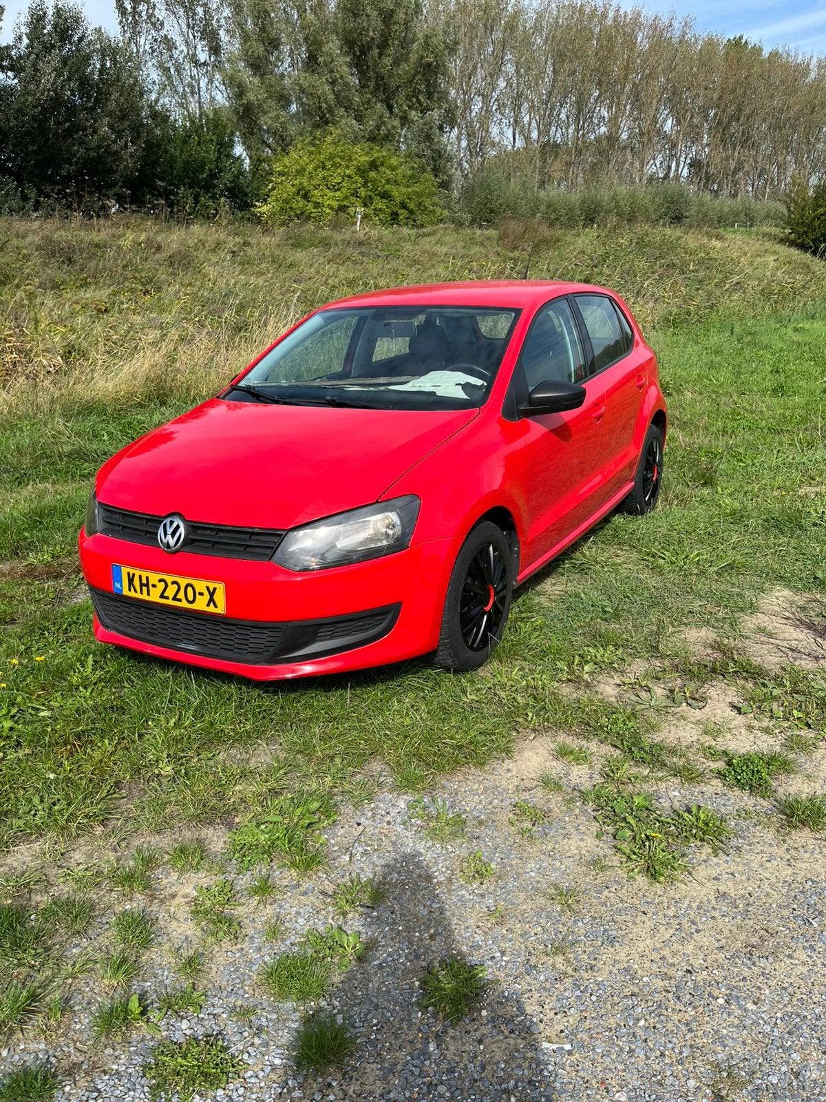 Volkswagen Polo 1.2 51KW 2009 Rood, Auto's, Voorwielaandrijving, 967 kg, 40 €/maand, 1198 cc