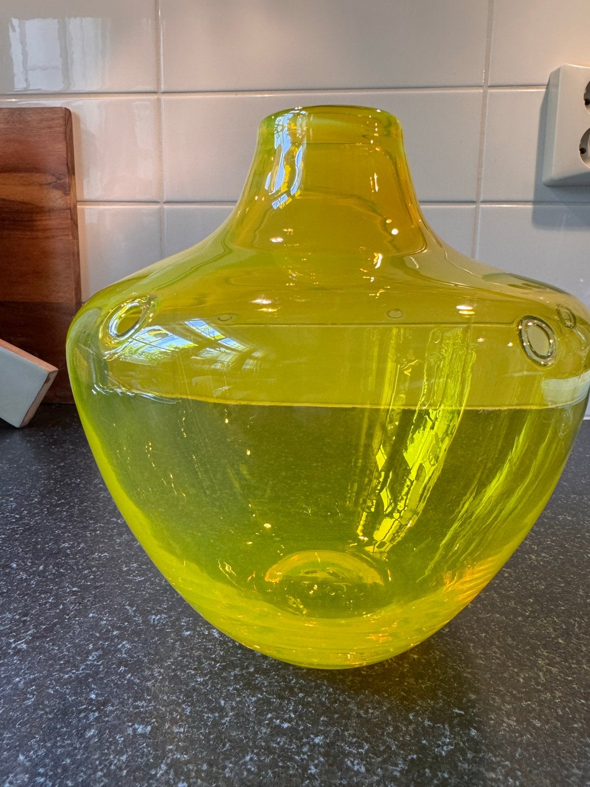 Grote gele glazen vaas, Ophalen
