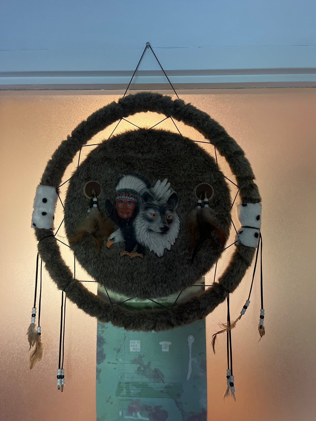 Dromenvanger met indianen- en wolvenmotief, Ophalen