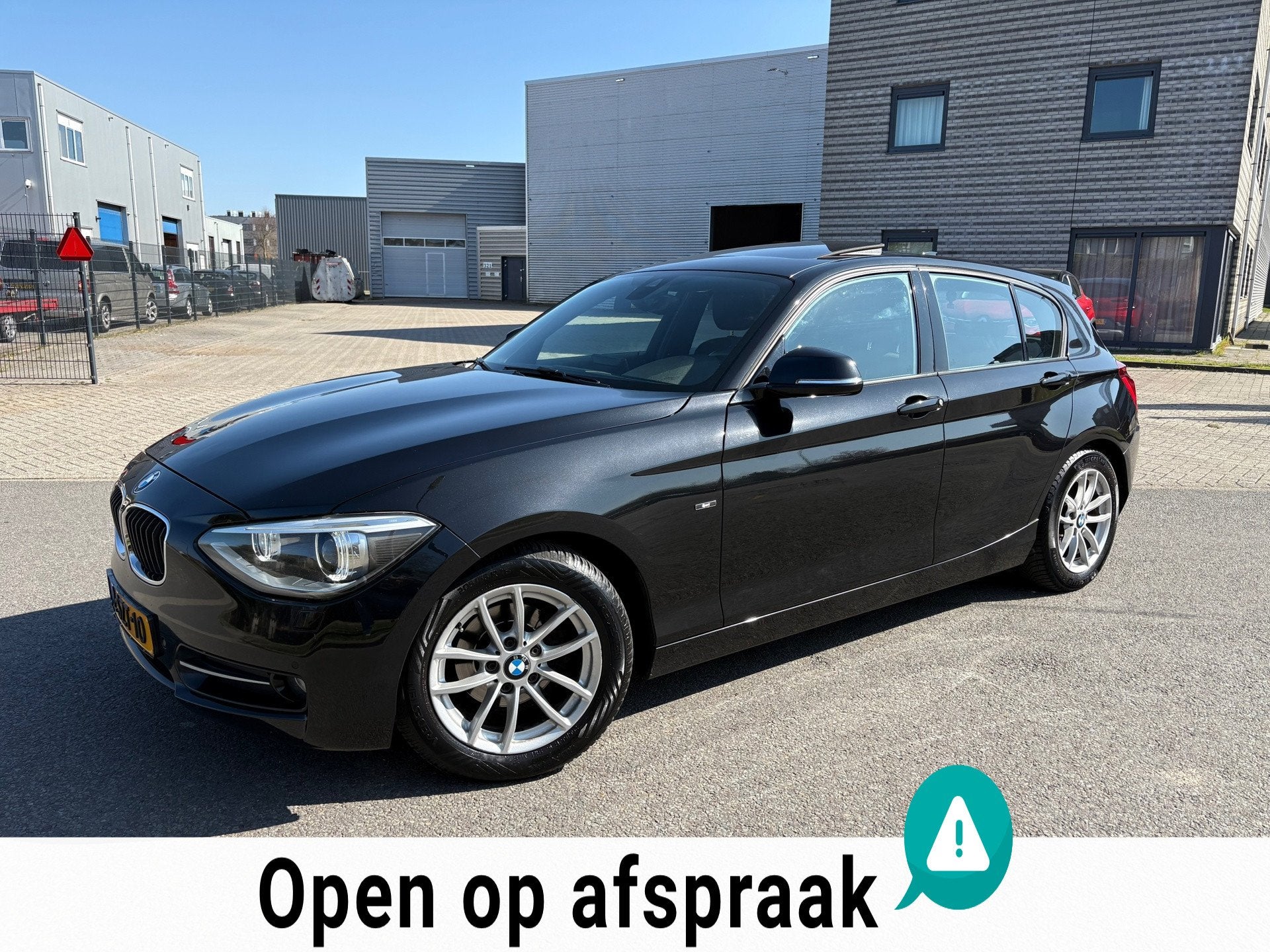 BMW 1-serie 116i EDE Business AUT Sport Dakraam|Stoelvrm|Xen, Auto's, Euro 5, Gebruikt, 4 cilinders, Zwart