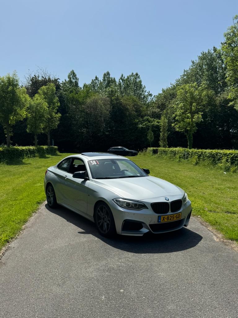 BMW M235I Coupe Automaat, Auto's, Automaat, Achterwielaandrijving, Zwart, 1589 kg