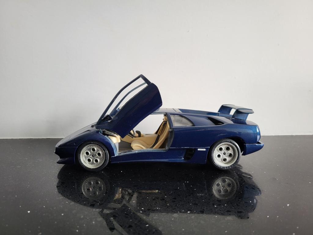 Lamborghini Diablo blauw 1/18 Bburago, Hobby en Vrije tijd, Modelauto's | 1:43, Ophalen of Verzenden, Zo goed als nieuw, Auto