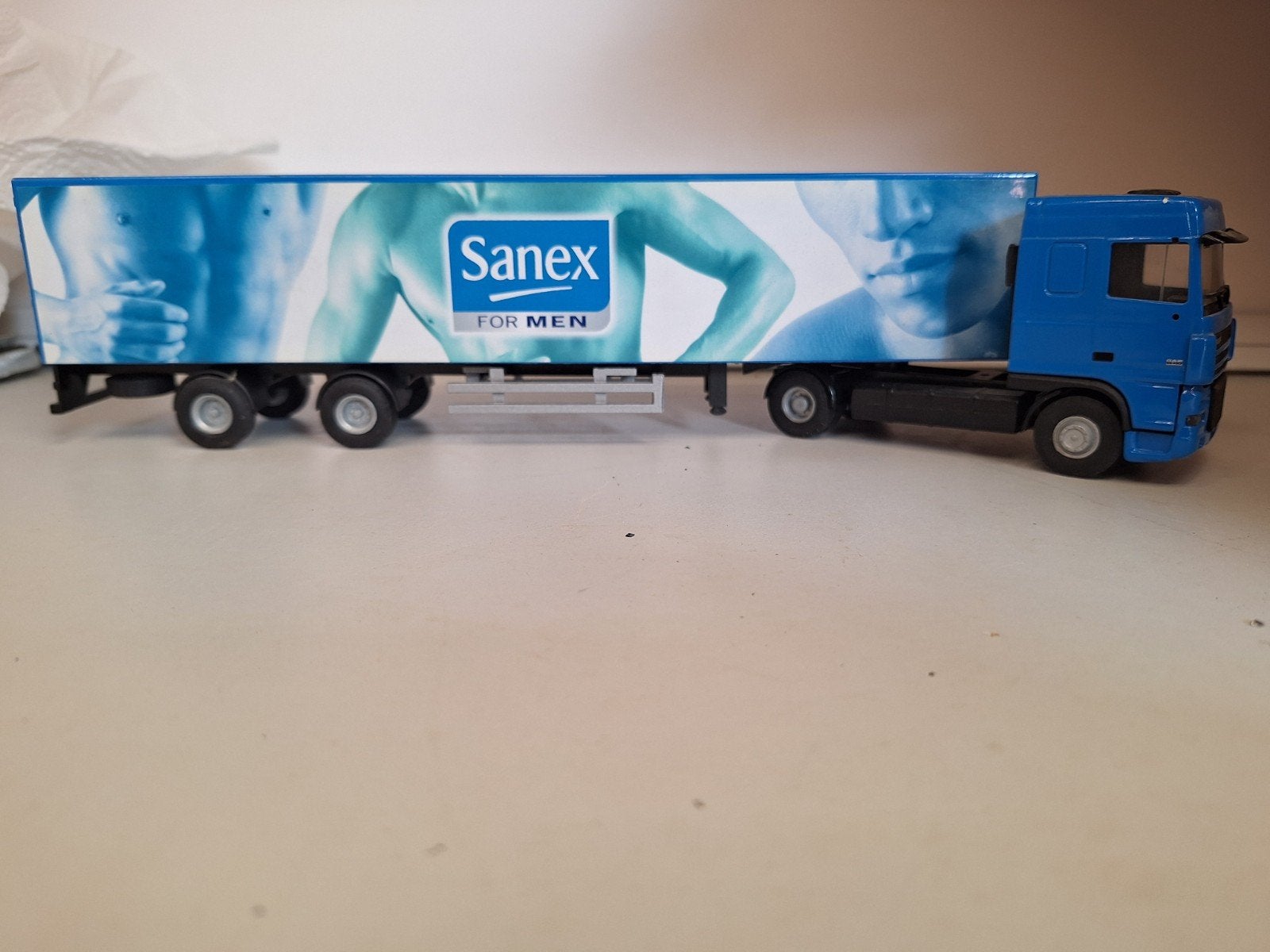 Lion toys DAF XF Sanex 1:50, Ophalen of Verzenden, Zo goed als nieuw, Bus of Vrachtwagen, Lion Toys