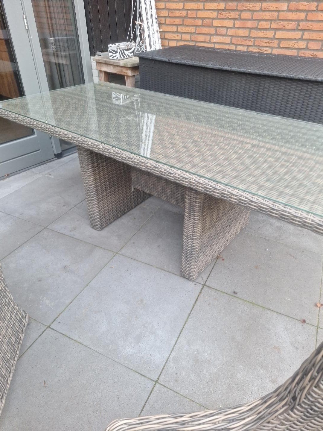 Wicker tuintafel met glazen blad, Ophalen of Verzenden, Gebruikt, Rechthoekig, Wicker