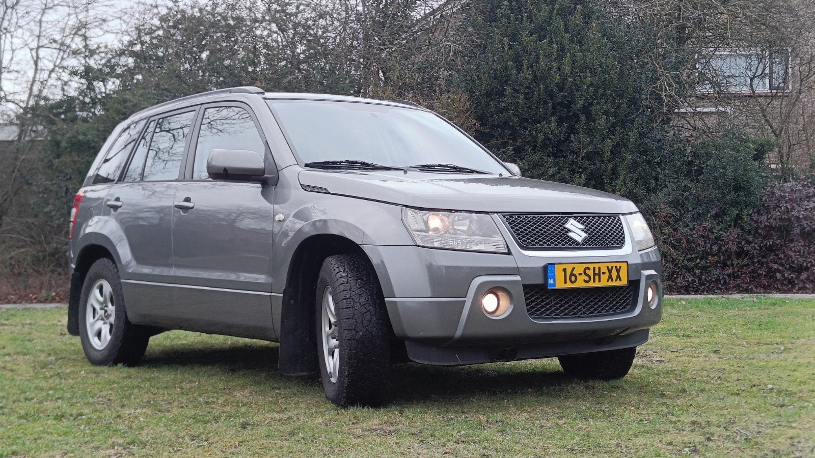 Suzuki Grand Vitara 2.0 5D AUT 2006 Grijs (APK juni 2027!), Auto's, Suzuki, Automaat, 1995 cc, Zwart, 4 cilinders
