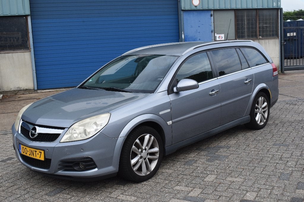 Opel Vectra 1.8 16V St.wgn 2009 Grijs, Auto's, Lederen bekleding, Zwart, 4 cilinders, 1796 cc