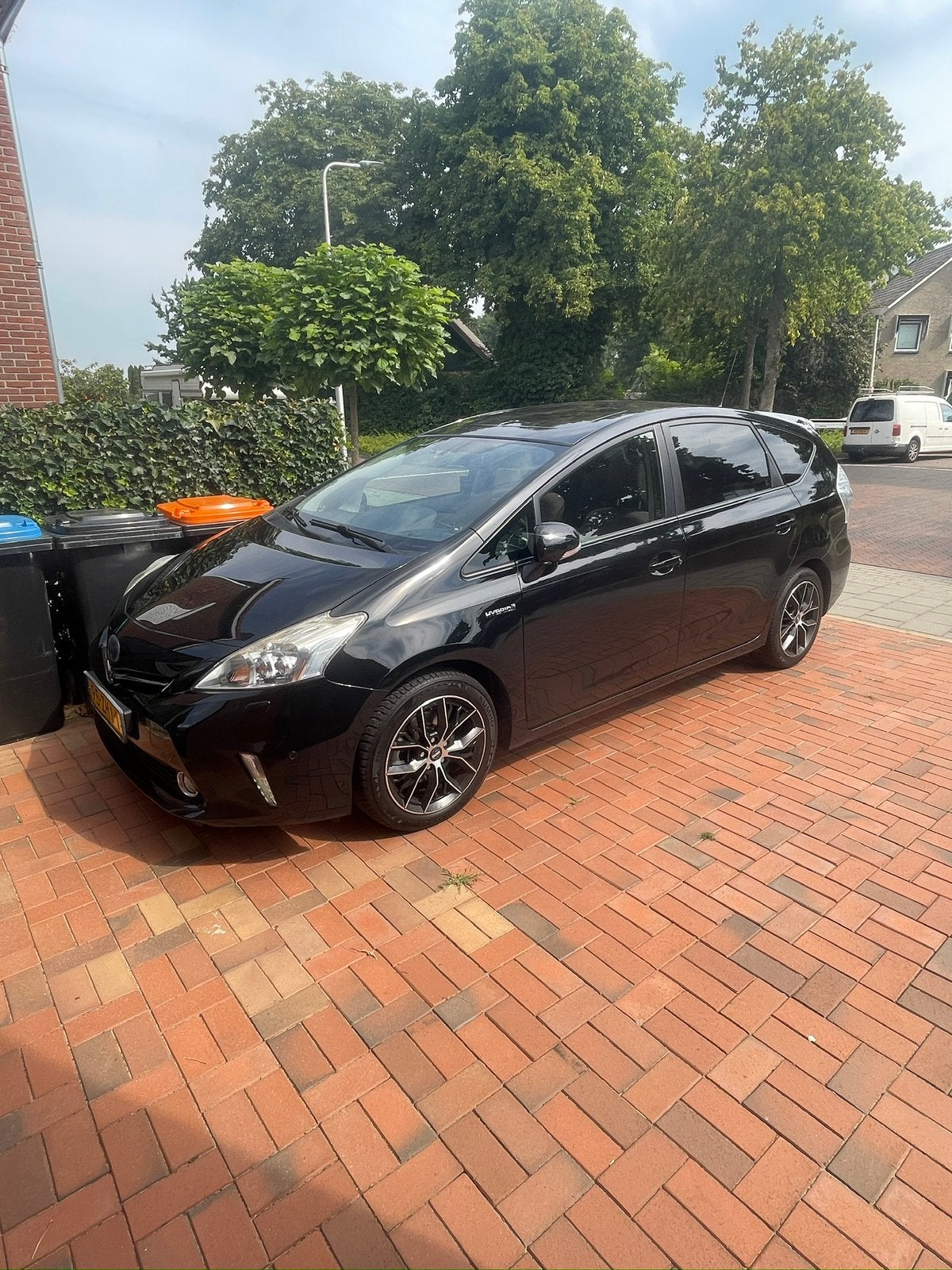 Toyota Prius Wagon 1.8 Full Hybrid 136PK Aut 96g 2012 Zwart, 4 cilinders, 7 stoelen, Zwart, Origineel Nederlands