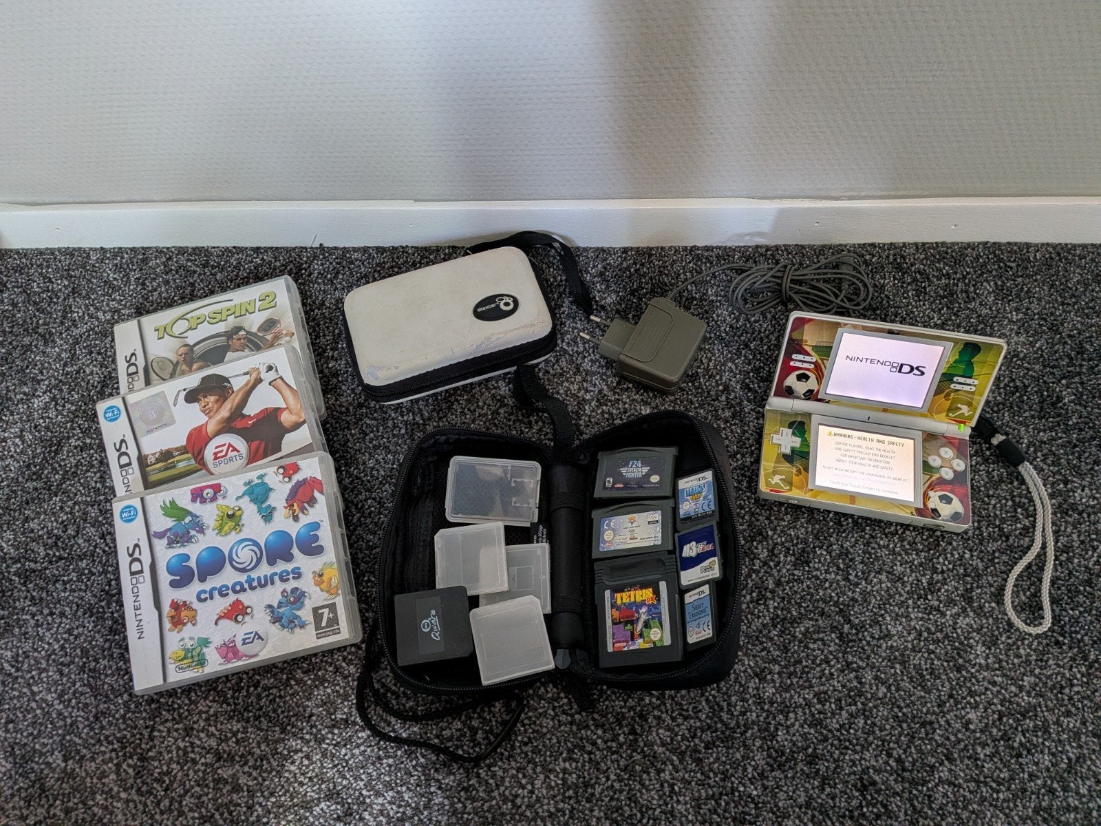 Nintendo ds met hoesje, spellen en oplader., Ophalen of Verzenden, Gebruikt