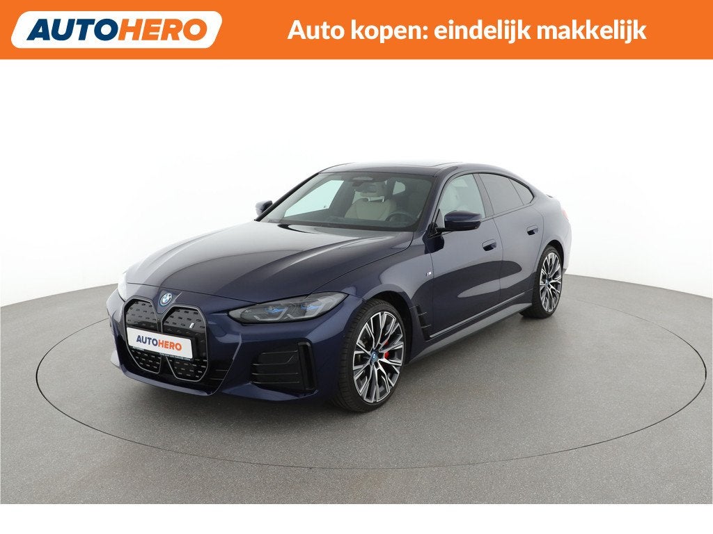 BMW i4 eDrive40 High Executive 84 kWh |PK02422| (bj 2023), Auto's, BMW, Achterwielaandrijving, Gebruikt, Met garantie (alle), Blauw