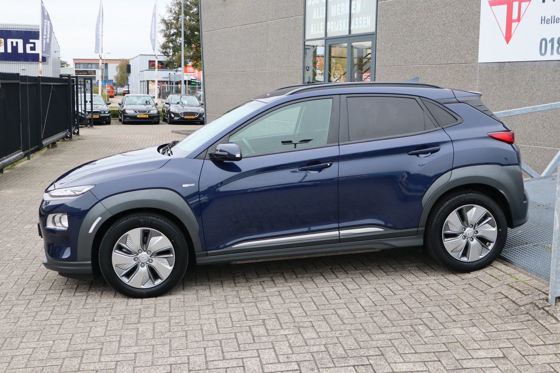 Hyundai KONA EV Fashion 64 kWh Nederlandse auto/Apple carpla, Auto's, 12 maanden, Stof, Gebruikt, Zwart