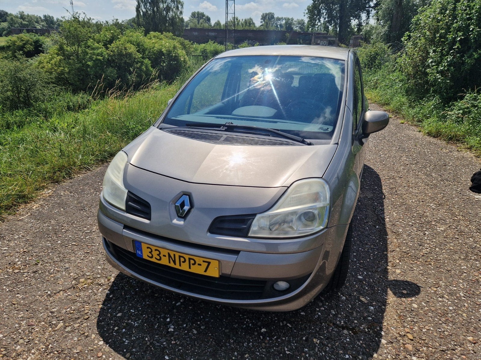 Renault Grand Modus 1.2 TCE 2010 Beige, Auto's, Voorwielaandrijving, 4 cilinders, 100 pk, Origineel Nederlands