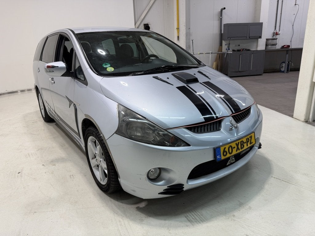 Mitsubishi Grandis 2.4-16V Intense (bj 2007), Auto's, Stof, Gebruikt, 7 stoelen, Bedrijf