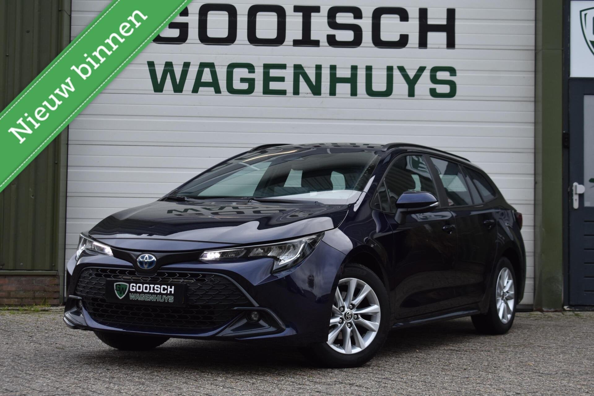 Toyota Corolla Touring Sports Hybrid 140 Active | Camera | C, 450 kg, 4 cilinders, Met garantie (alle), Blauw
