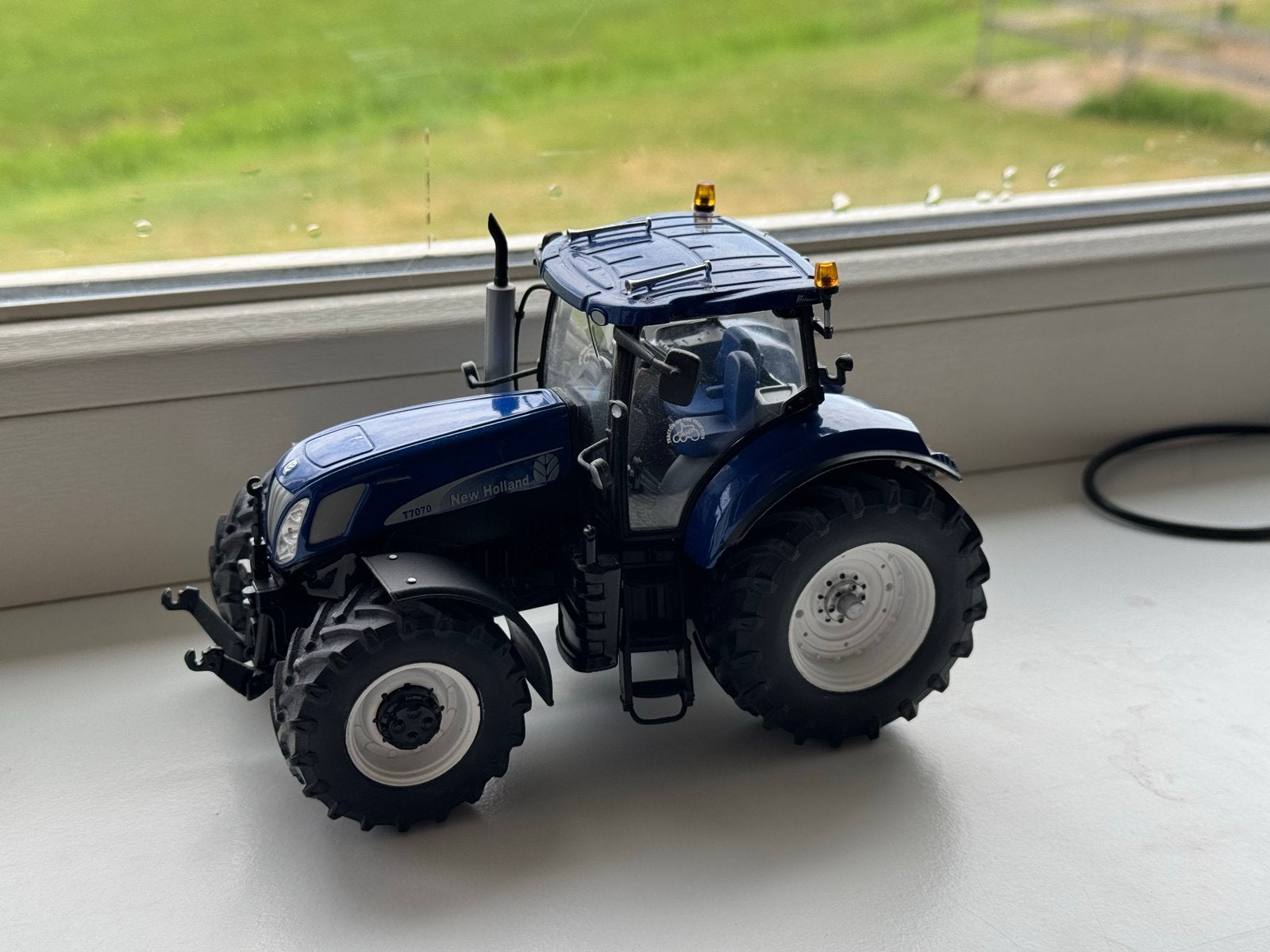 New Holland T7070 ROS Blue Power - Verbouwd Model, Ophalen of Verzenden, Zo goed als nieuw