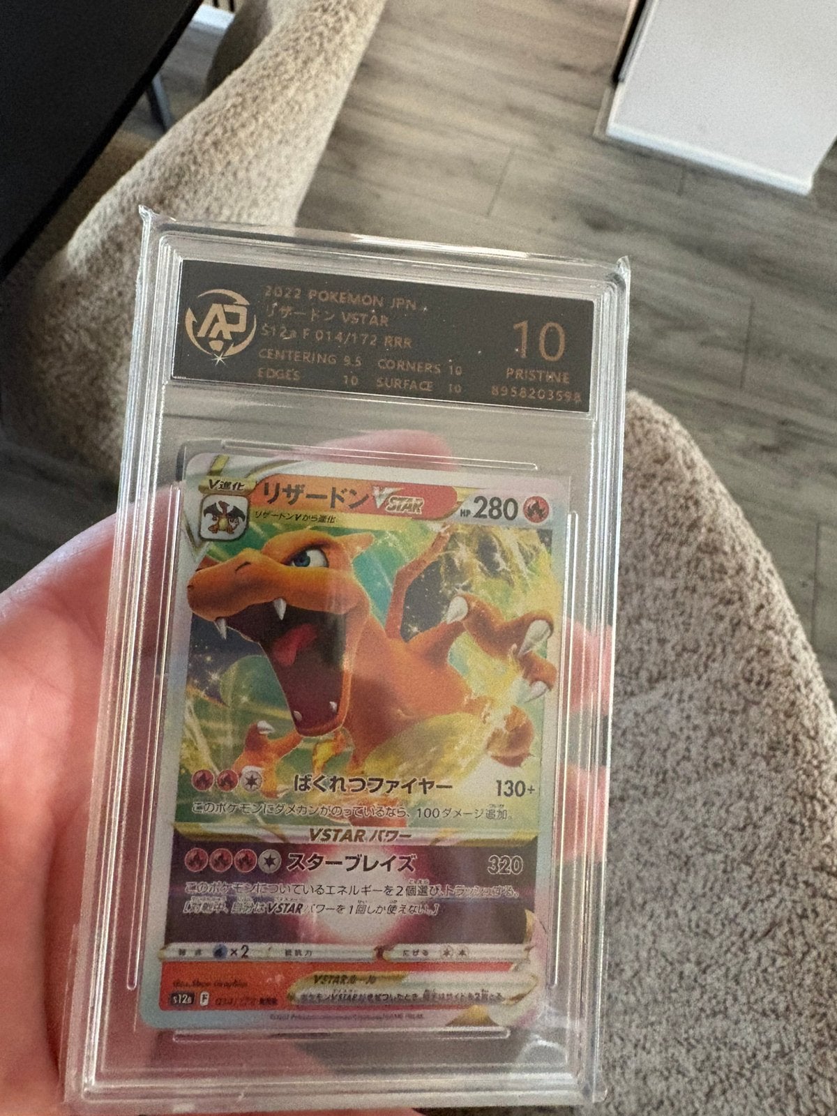 Charizard vstar pristine 10, Ophalen of Verzenden, Zo goed als nieuw, Meerdere kaarten, Foil