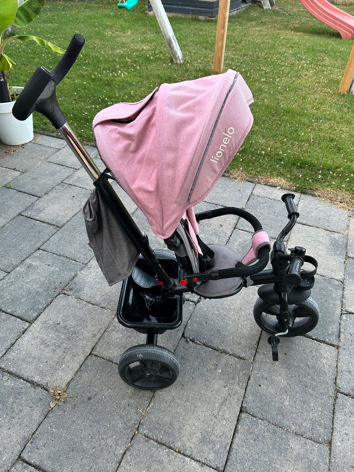 Lionelo driewieler oud roze met duwstang, Ophalen, Zo goed als nieuw, Velgrem, Duwstang