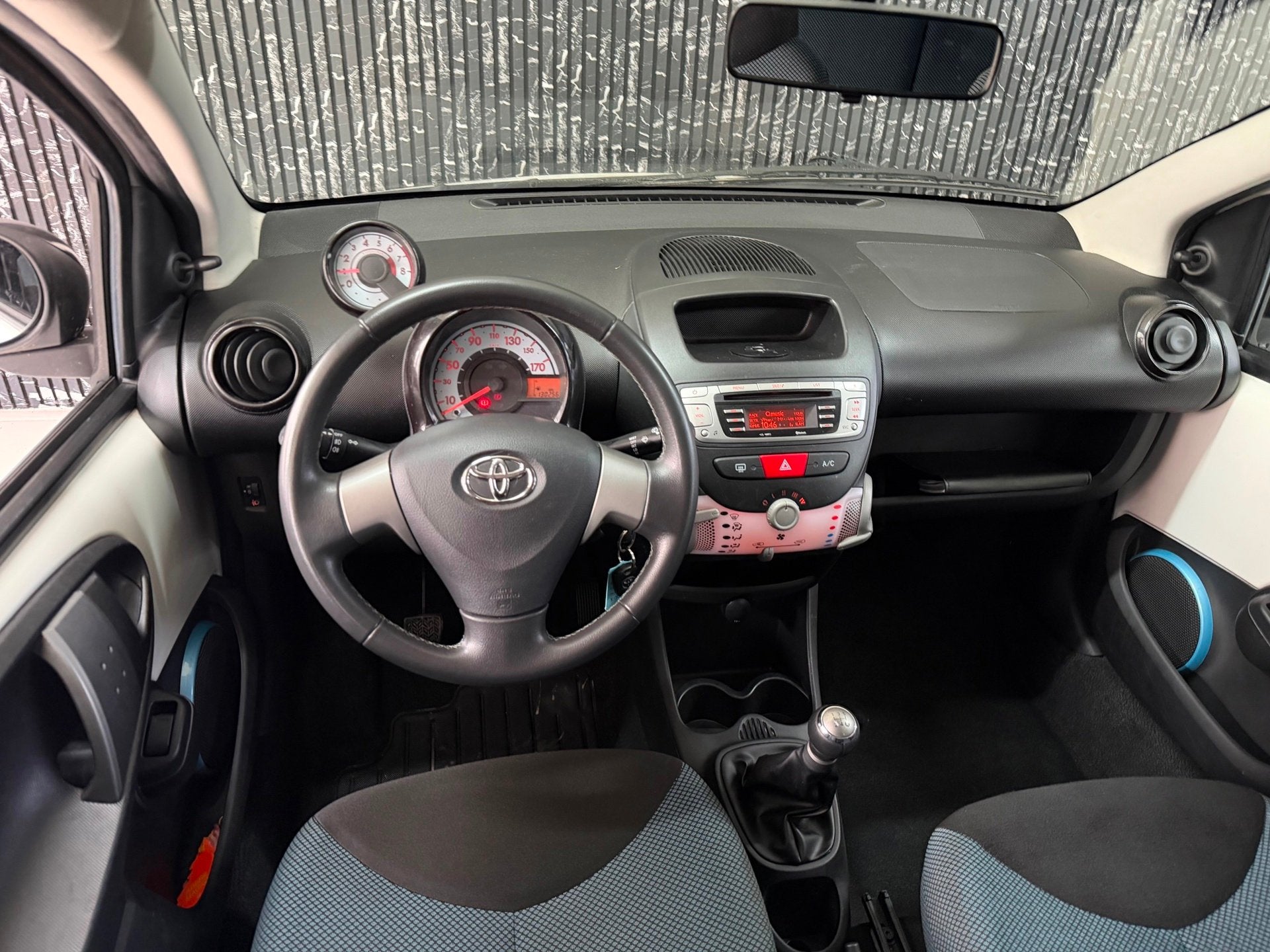 Toyota Aygo 1.0 VVT-i Dynamic Blue Airco, Auto's, Voorwielaandrijving, Euro 5, Gebruikt, 4 stoelen