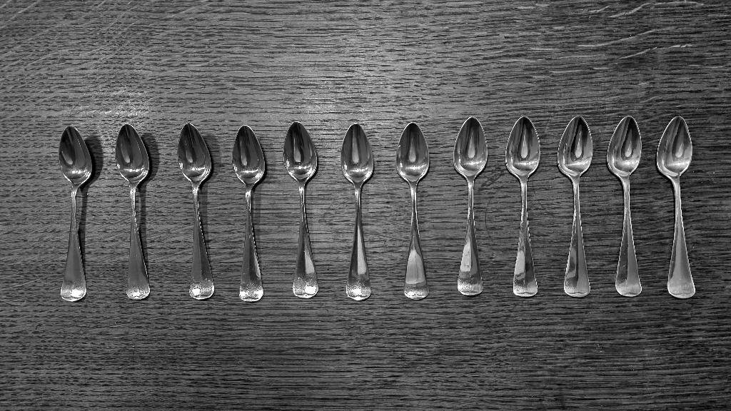 12 zilveren Haags Lofje lepels, Ophalen of Verzenden