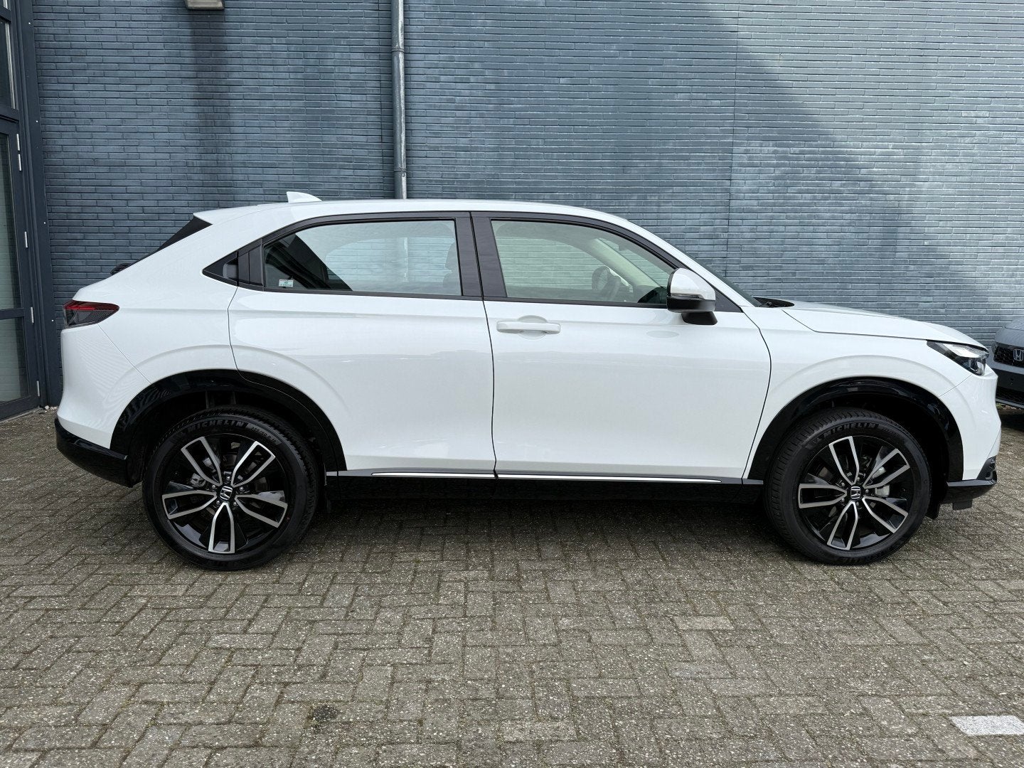 HONDA HR-V 1.5 e:HEV Hybrid 131pk Automaat Advance | Navi &, Auto's, Automaat, Automatische klimaatregeling, Leder en Stof, Wit