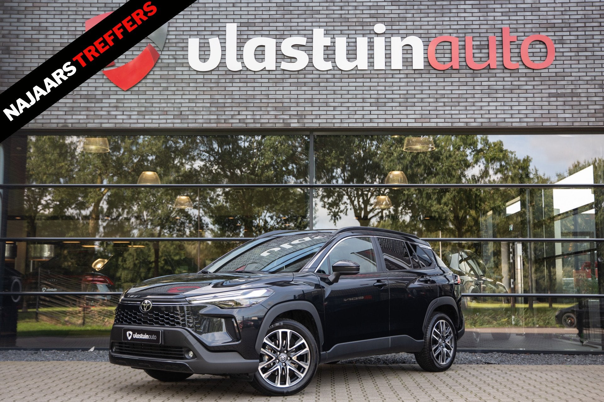 Toyota Corolla Cross Hybrid 140 Dynamic , Achteruitrijcamera, Auto's, Stof, Gebruikt, Zwart, 4 cilinders