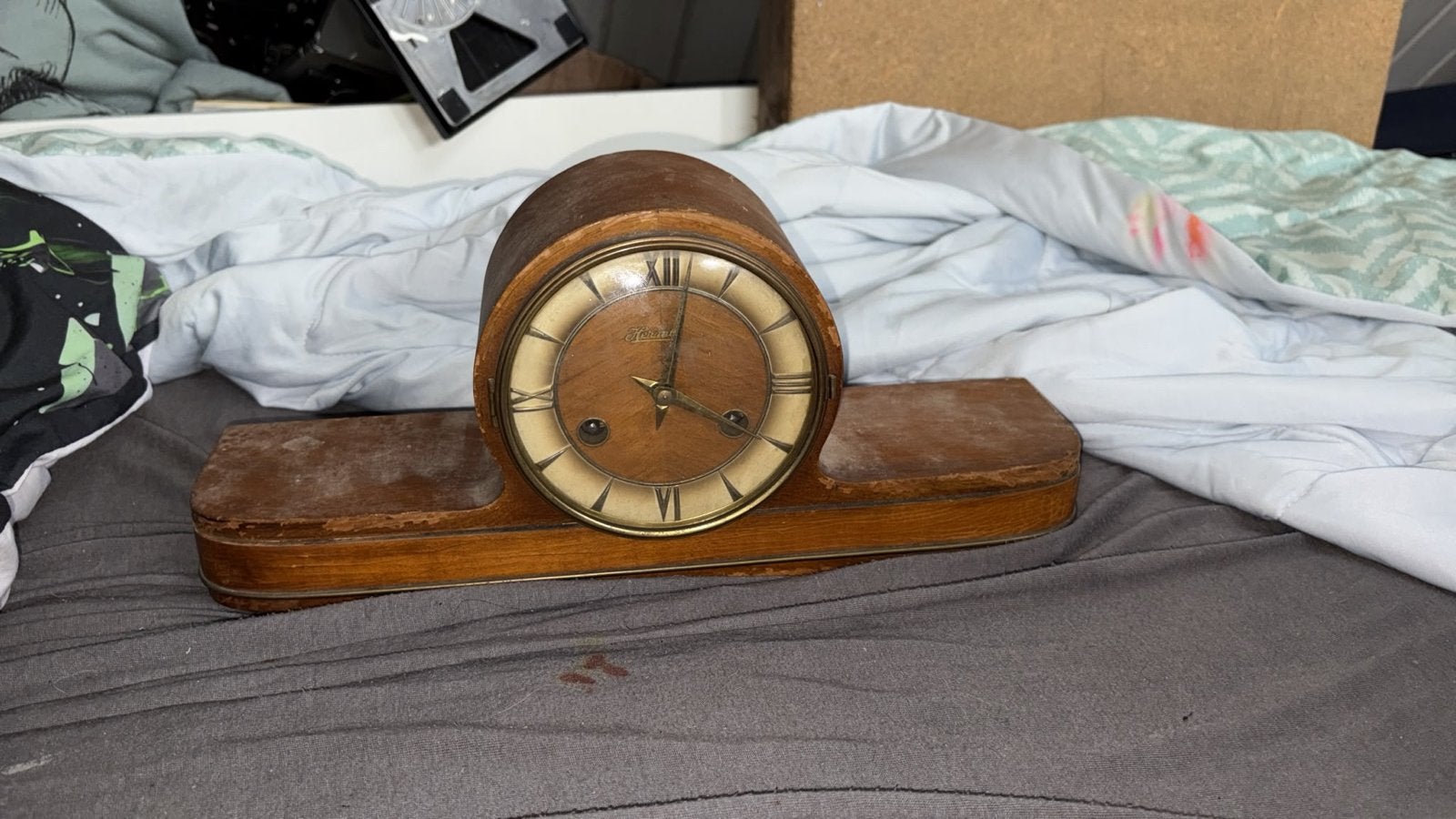 Antieke houten schoorsteenklok, Ophalen