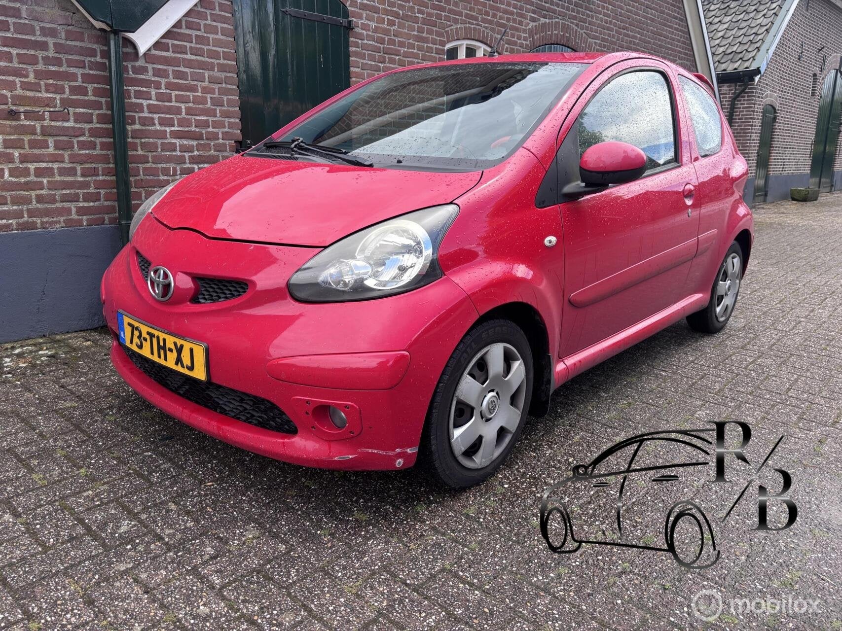 Toyota Aygo 1.0-12V AIRCO VASTE PRIJS INRUILKOOPJE, Voorwielaandrijving, Stof, Gebruikt, Zwart