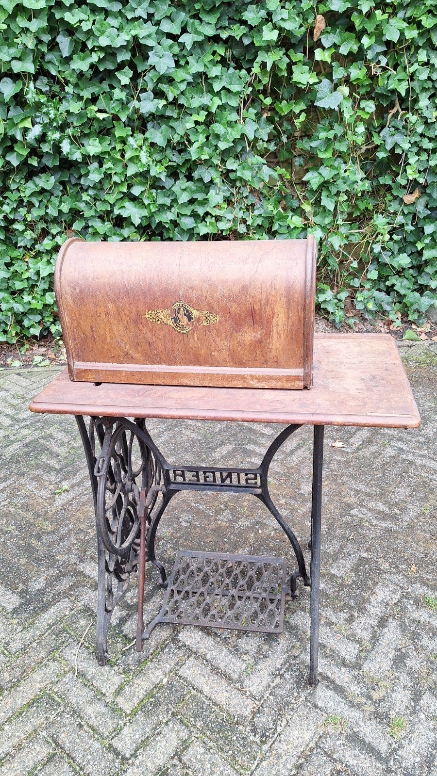 antieke Singer naaimachine, Ophalen