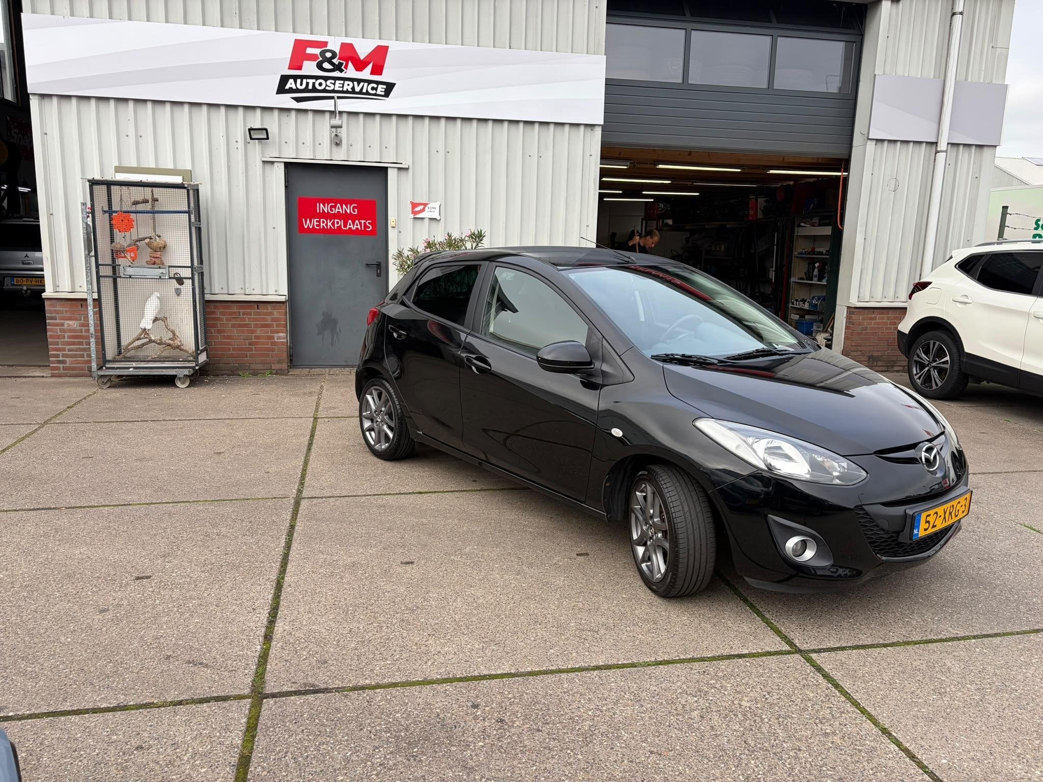 Mazda 2 1.3 Navigator GT BIFUEL, Airco, navi, stoelverwarmin, Voorwielaandrijving, Euro 5, Stof, Zwart