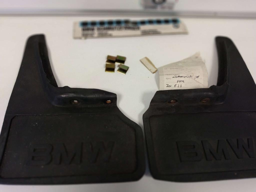 BMW E23 originele spatlappen set voor 72601887363 Nieuw, Niet ingevuld, Niet ingevuld, Nieuw, Ophalen of Verzenden