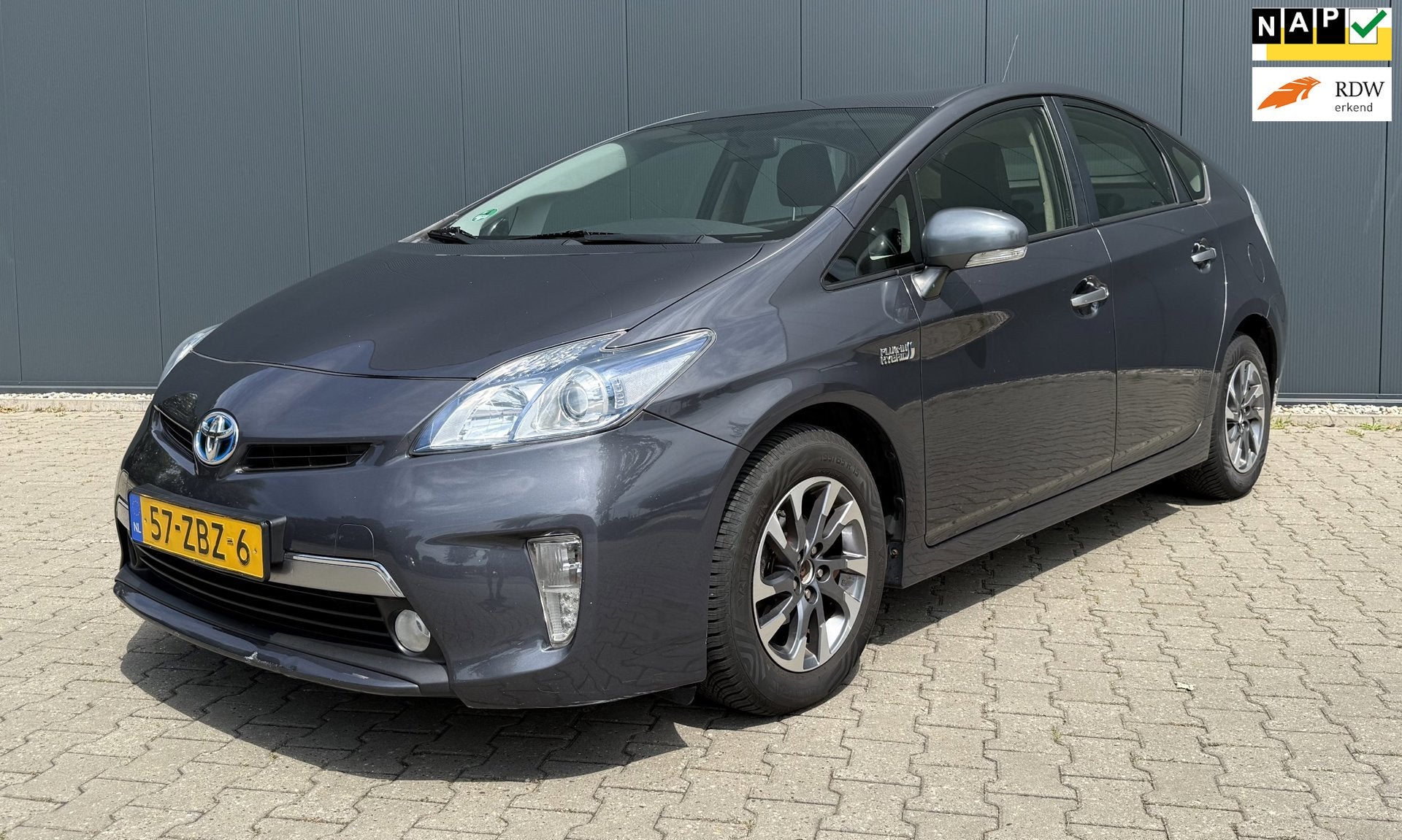 Toyota Prius 1.8 Plug-in Aspiration Airco Cruise Automaat AP, Auto's, Euro 5, Stof, Gebruikt, Zwart