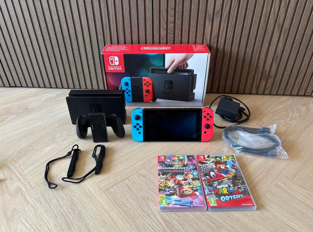 Nintendo switch + mario kart en mario odyssey, Spelcomputers en Games, Ophalen, Met games, Met 2 controllers, Zo goed als nieuw