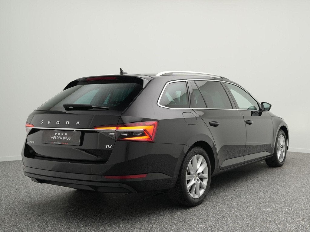 Skoda Superb Combi 1.4 TSI 218pk iV Business Edition Plus |, Auto's, Skoda, Stof, Gebruikt, 4 cilinders, Zwart