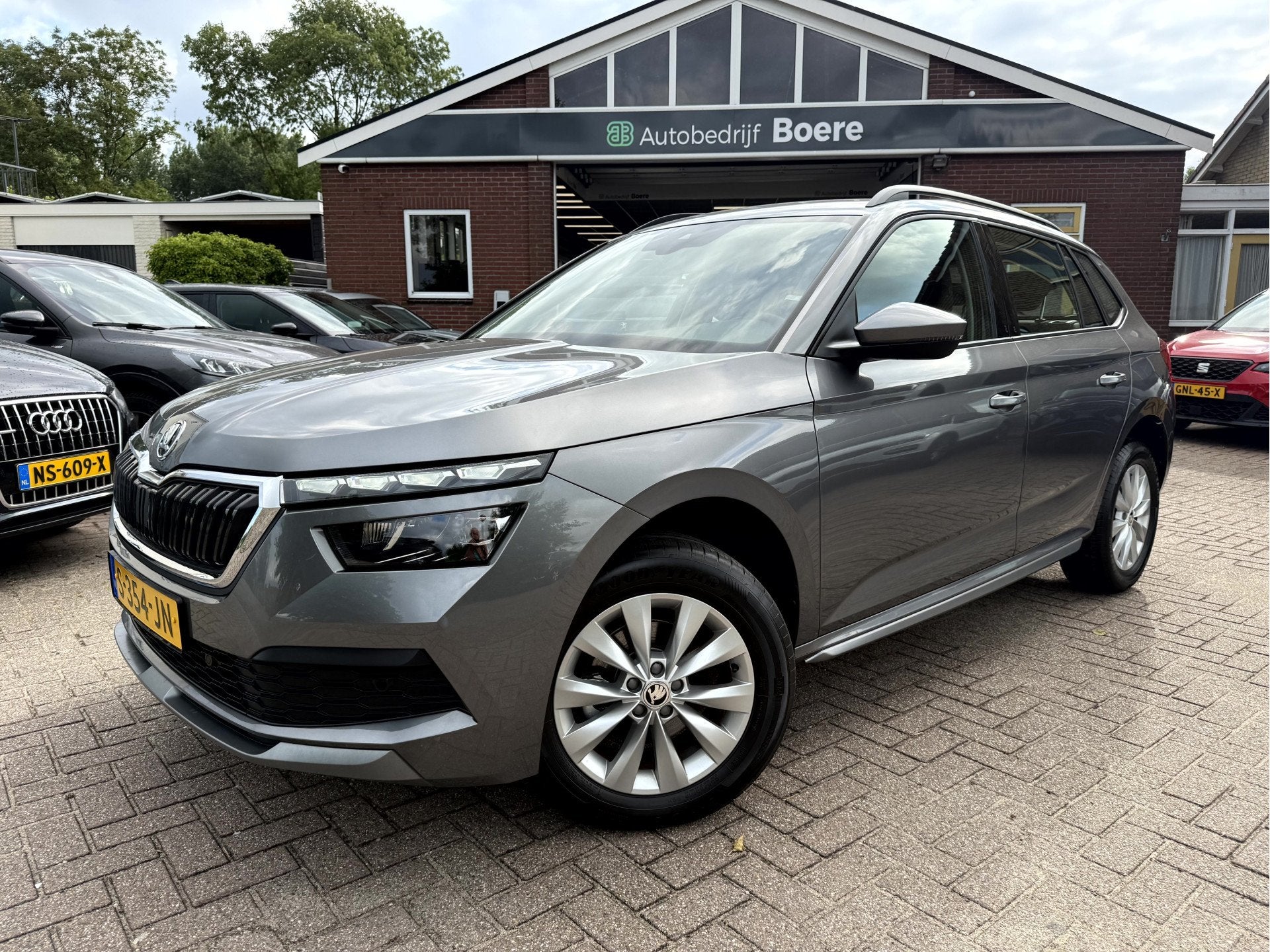 Skoda Kamiq 1.0 TSI Business Edition slechts 1369km!, Virt.D, Stof, Gebruikt, 620 kg, 49 €/maand