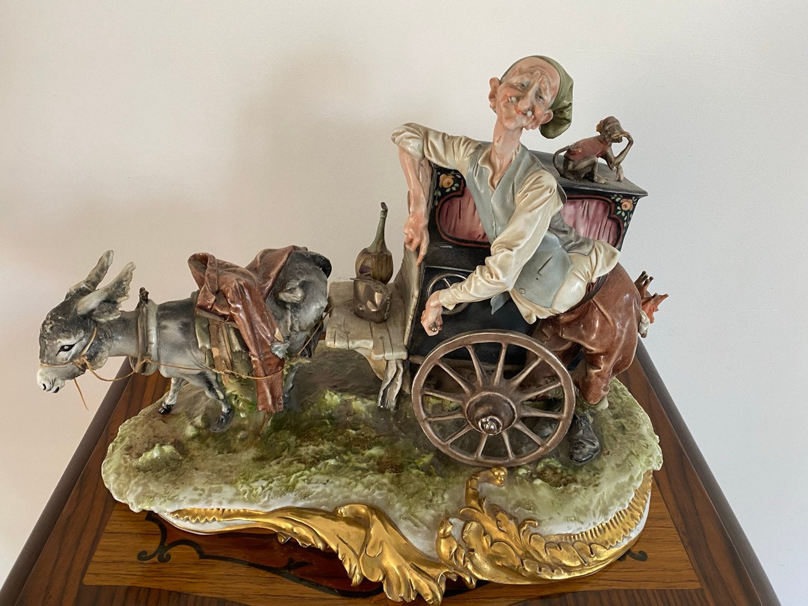 Capodimonte beeld: Man met draaiorgel en ezel, Ophalen