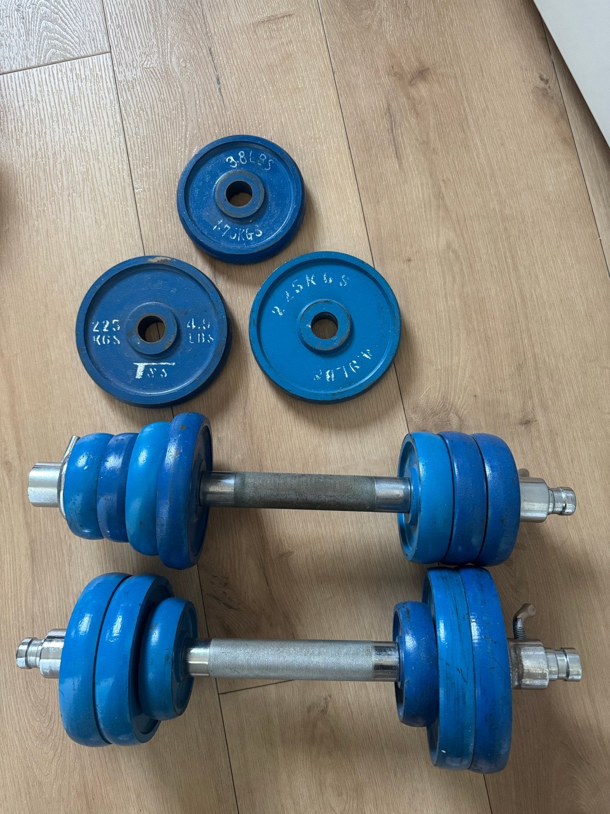 4 dumbbells met diverse gewichten (blauw en zwart), Ophalen, Gebruikt, Armen, Dumbbell