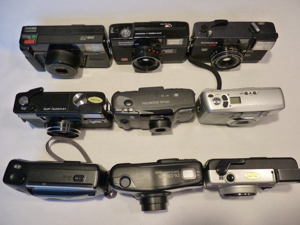 9 analoge camera’s: Nikon, Fuji, Minolta,Pentax,Konica,Braun, Ophalen of Verzenden, Zo goed als nieuw, Compact, Nikon