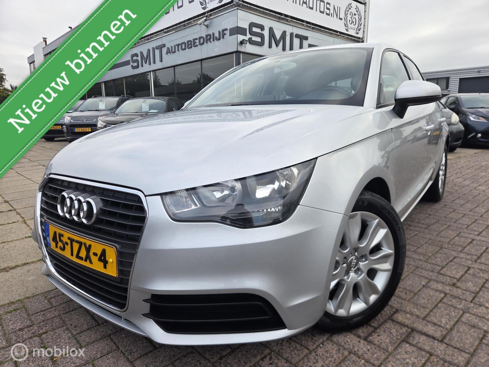 Audi A1 Sportback 1.6 TDI Attraction Pro Line Business MMI, Auto's, Voorwielaandrijving, Euro 5, Stof, Zwart