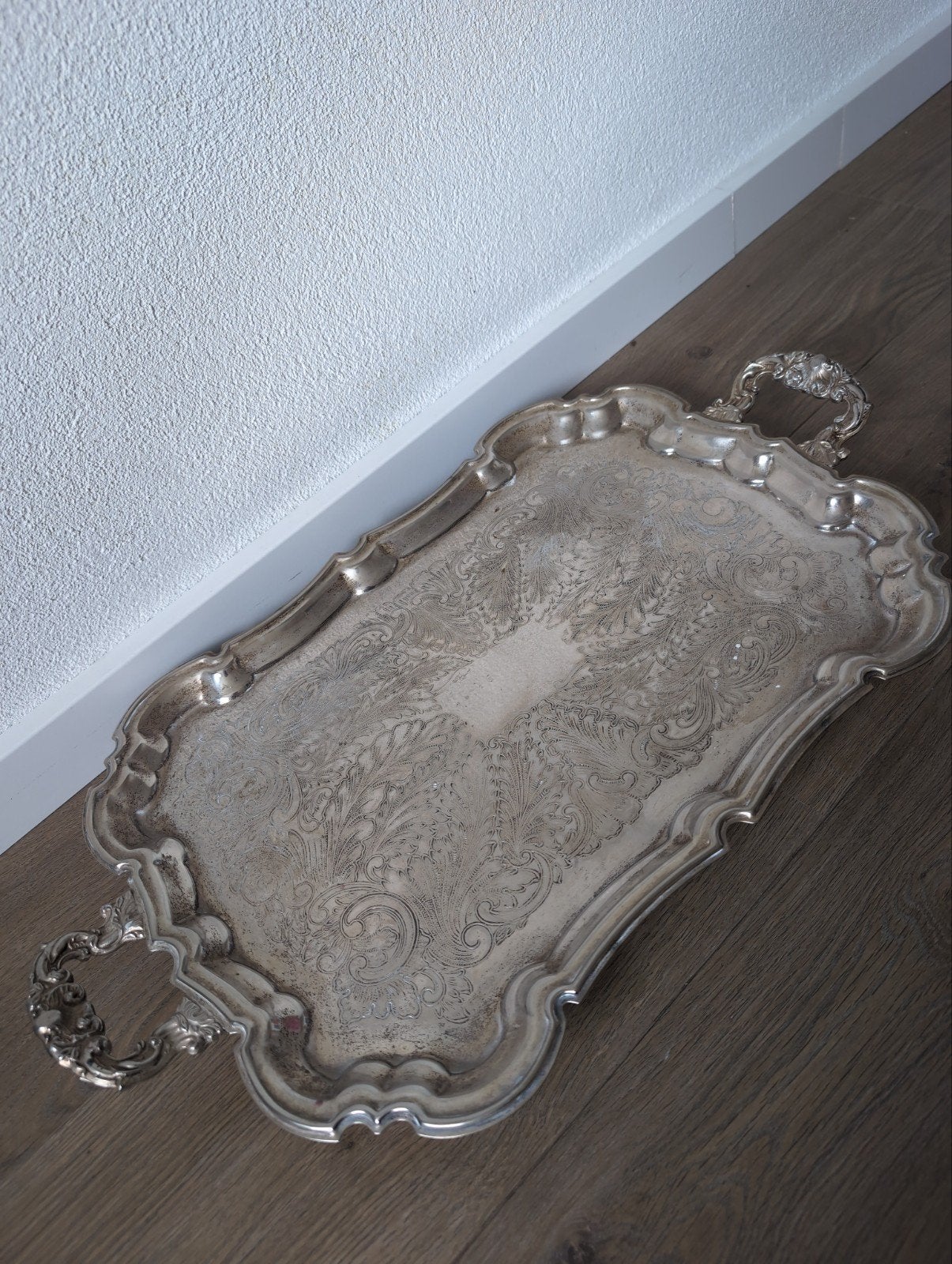 Zilveren plate van Leonard Silver, Ophalen