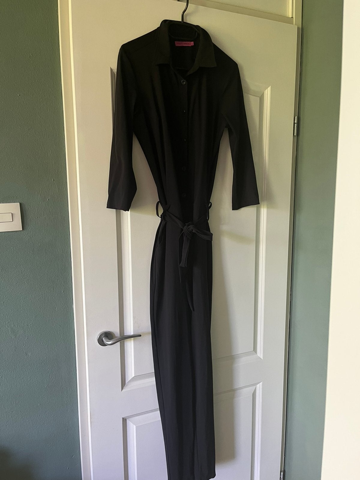 Zwarte Jumpsuit Angelique Studio Anneloes Maat L, Ophalen of Verzenden, Zo goed als nieuw, Maat 42/44 (L), Zwart