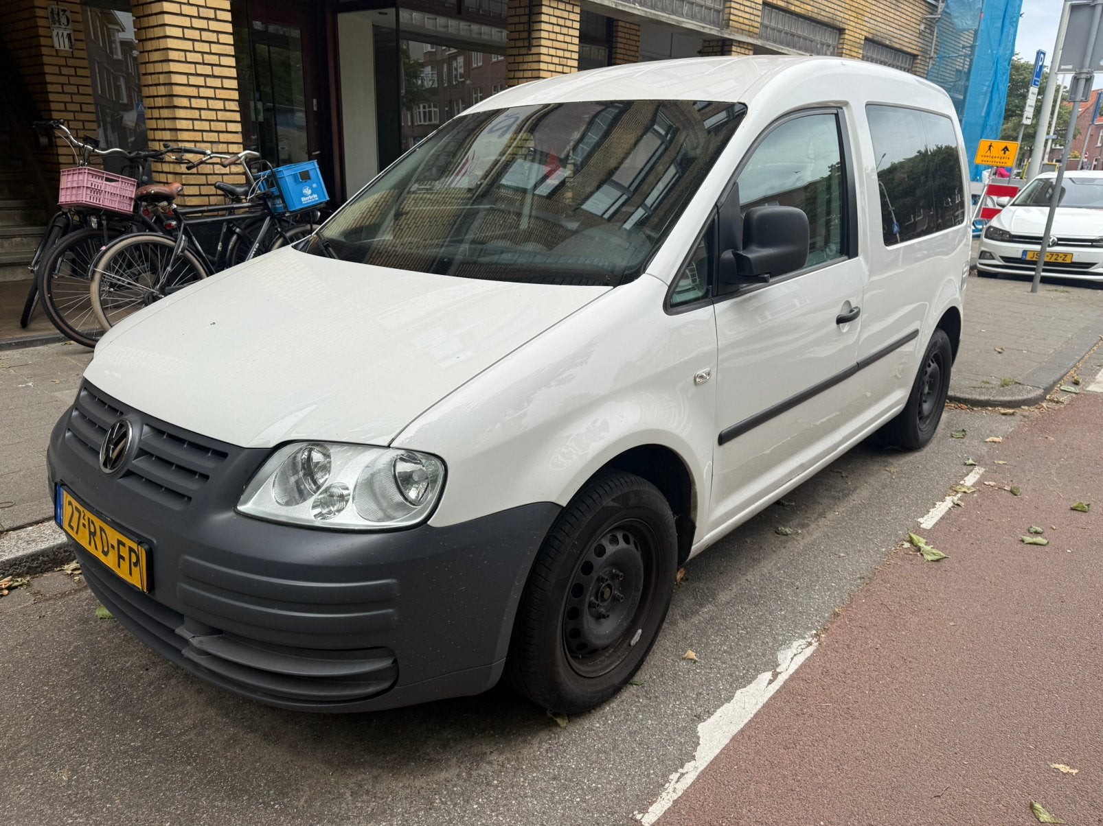 Volkswagen Caddy 7pers 1.4 55KW Combi 2005 Wit, Auto's, Bestelauto's, Voorwielaandrijving, Stof, 74 pk, 4 cilinders